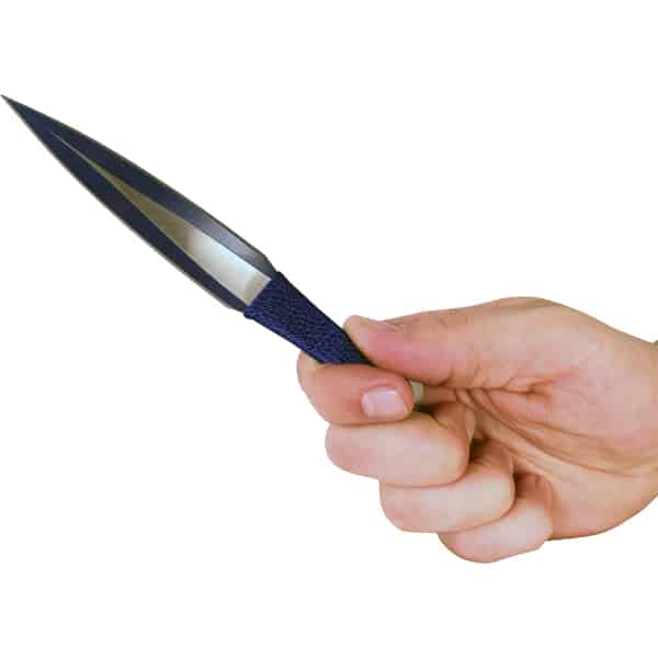 Hand holding a small sharp knife with a black handle, isolated on a white background.