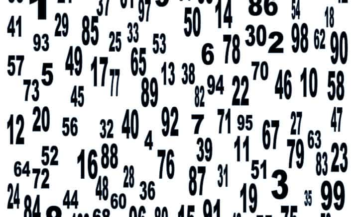 Random black numbers scattered on a white background, ranging from 1 to 99, in various sizes and orientations.