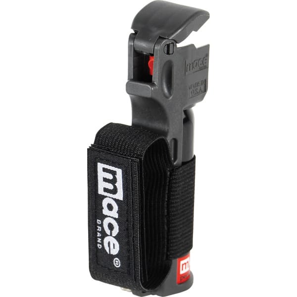 Mace brand pepper spray with wrist strap for personal safety and self-defense.