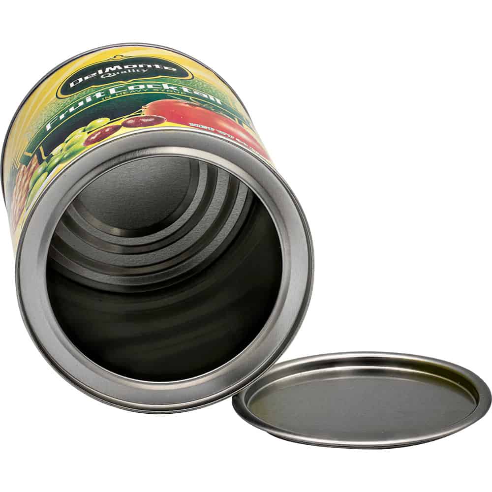 Open and empty Del Monte fruit cocktail tin can with lid placed beside it, showcasing vibrant label design.