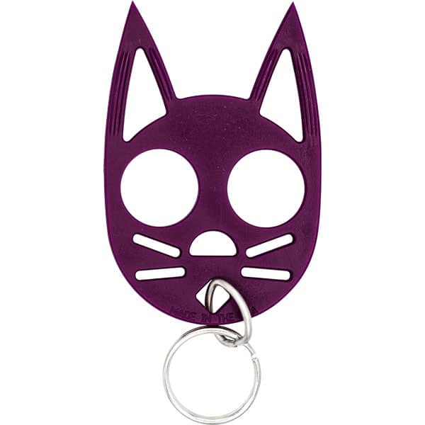 Purple cat-shaped keychain with ears and whiskers design, featuring a ring attachment.