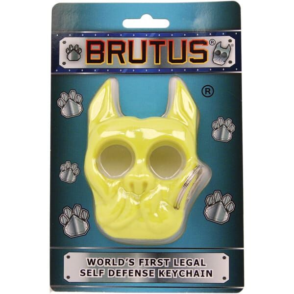 Brutus self-defense keychain in yellow packaging with paw print design, labeled as world's first legal self-defense tool.