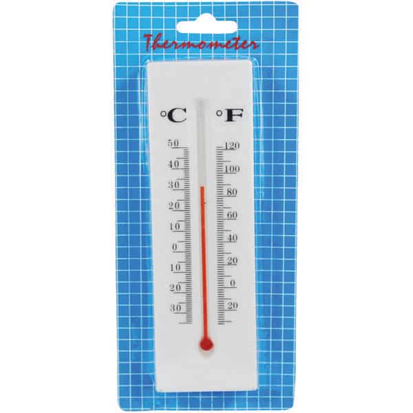 Wall thermometer displaying Celsius and Fahrenheit on a blue grid background.