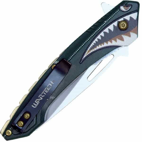 Folding knife with shark design handle and visible Wartech branding, featuring a sleek, modern look.