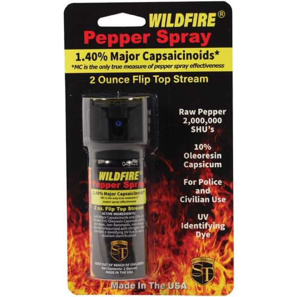 Wildfire pepper spray packaging with 1.40% capsaicinoids, 2 oz flip top, for police/civilian use, made in USA.